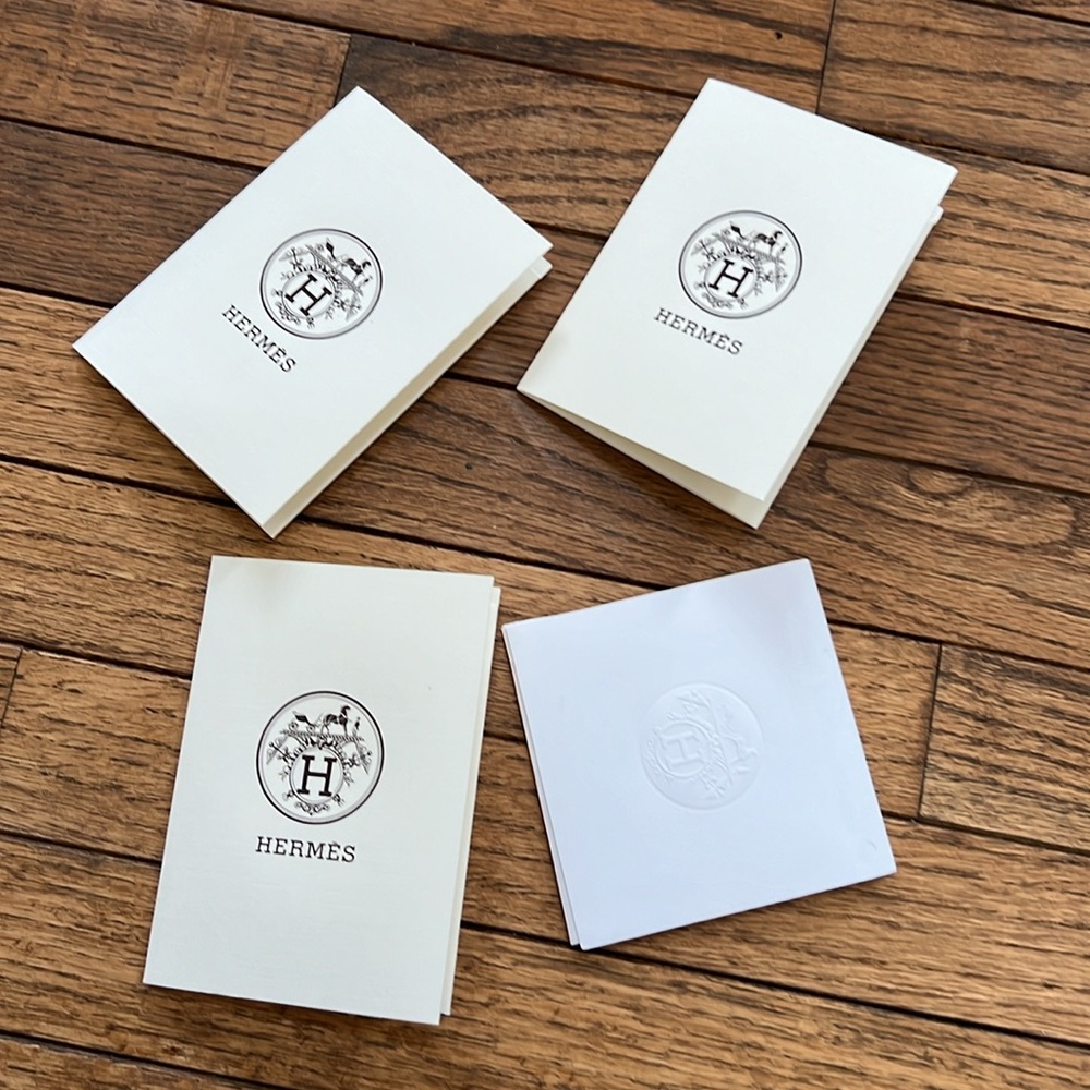 Authentic Hermes receipt holder and care booklet for leather